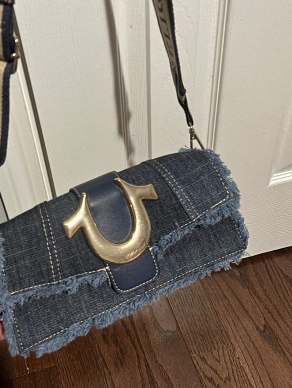 True Religion Frayed Denim Crossbody with Gold Horseshoe Accent